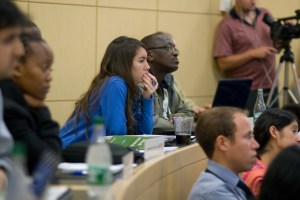 several participants, one looking concentrated